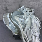 Balenciaga unisex sneakers close-up of laces, quarter panel, and cushioned heel.