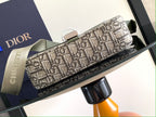 Olive green-trim Dior monogram pouch with zip top and attached strap