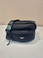 Prada black nylon crossbody bag with top zip and adjustable shoulder strap