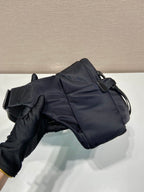 Prada black nylon shoulder bag with flap front, snap straps, and side seams