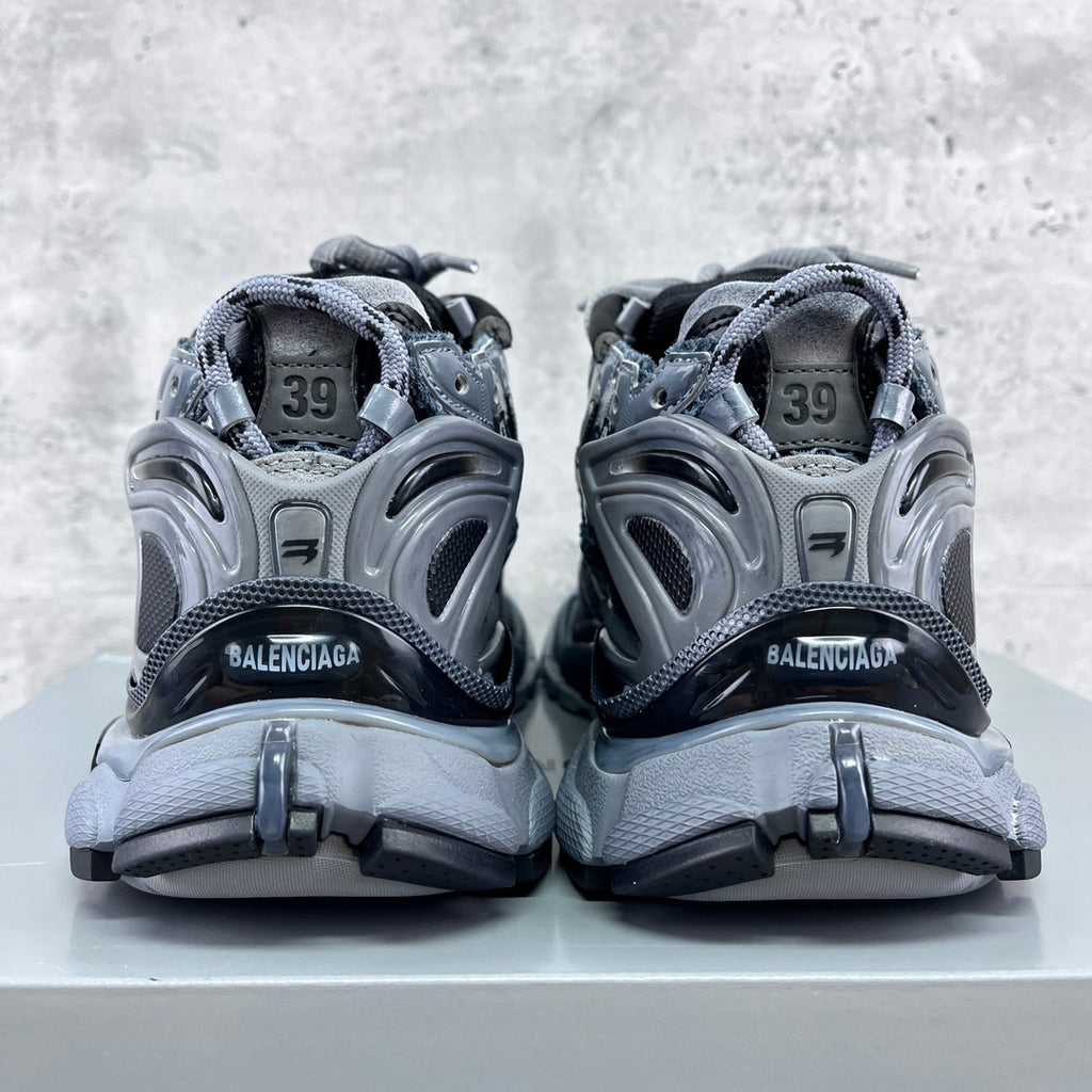 Back view of lace-up sneakers with BALENCIAGA branding and visible size 39 on heel tabs
