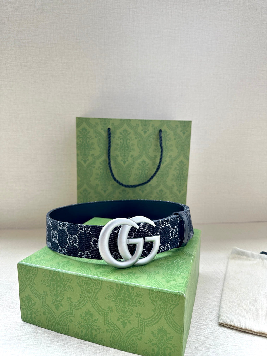 Gucci belt, dark navy GG canvas strap with silver double-G buckle