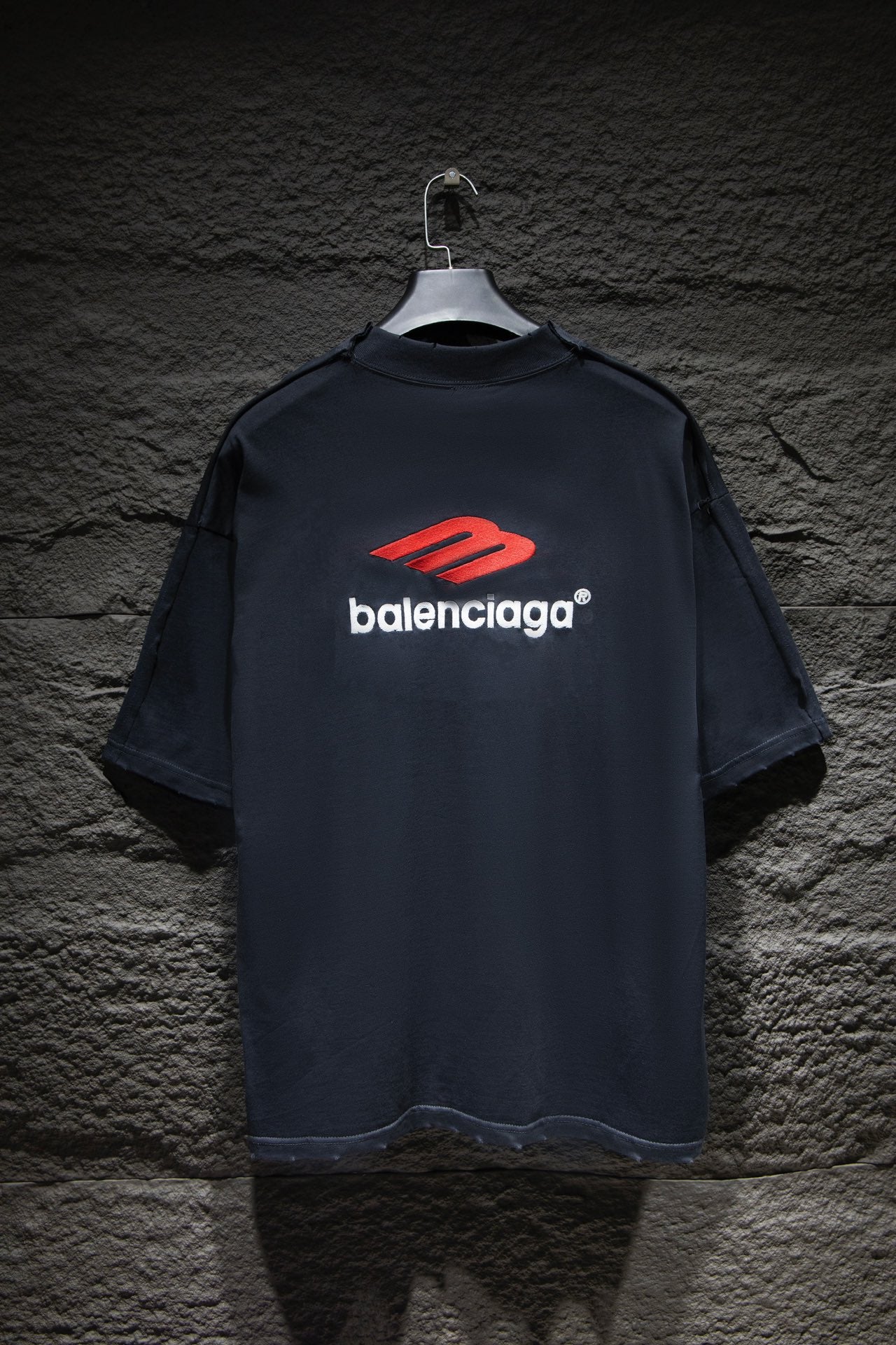 Balenciaga T-shirt with dark navy back featuring red logo and balenciaga text