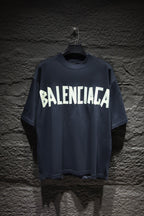 Balenciaga T-shirt in dark navy with large white BALENCIAGA graphic on the front