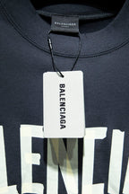 Balenciaga T-shirt neckline with tag at collar and embroidered logo detail