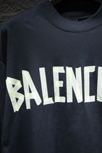Balenciaga T-shirt in dark navy with oversized distressed white BALENCIAGA lettering