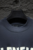 Balenciaga T-shirt collar area in dark navy with clean ribbed crew neckline