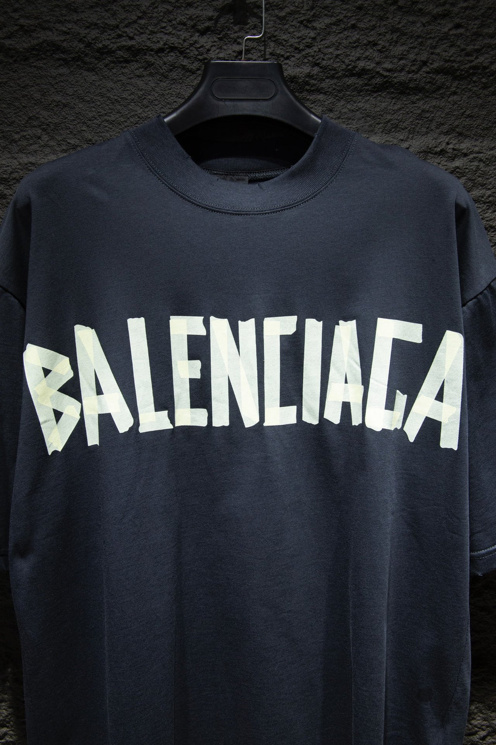 Balenciaga T-shirt in dark navy with large white BALENCIAGA logo across chest