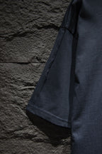 Balenciaga T-shirt side view in dark navy showing sleeve and hem stitching