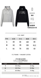 Size chart and two Maison Margiela hoodies: light gray and black
