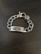 Chrome accessories charm bracelet with engraved links and central bar clasp