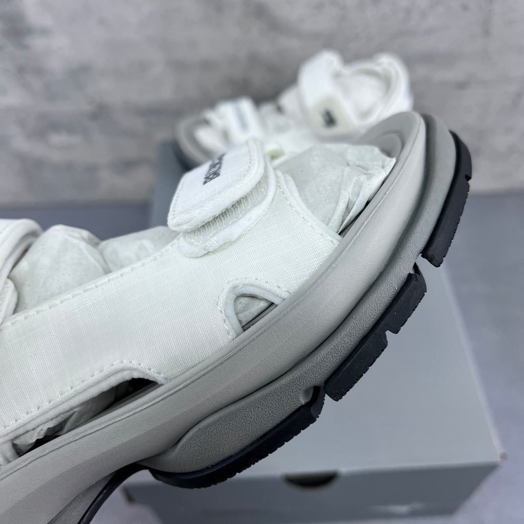 Balenciaga unisex white sandal close-up of upper strap and thick light-gray sole