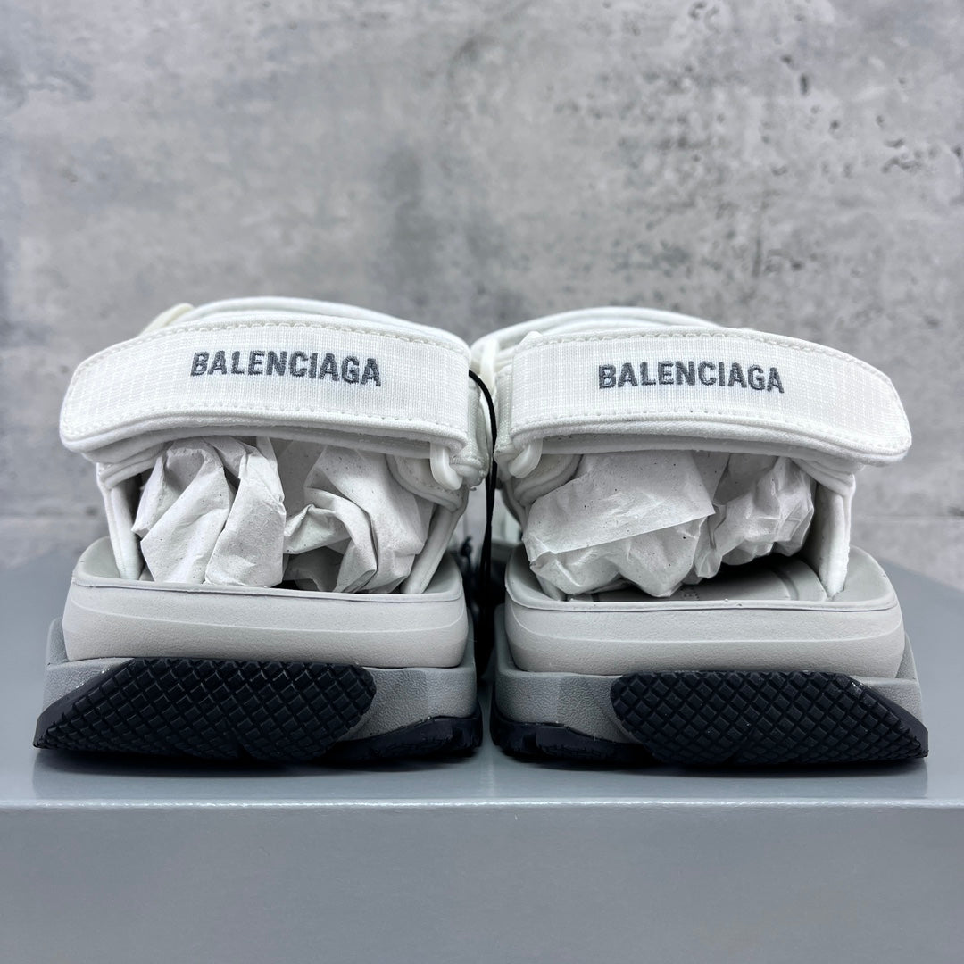 Balenciaga unisex white sandals rear view with logo strap and dark outsole edge