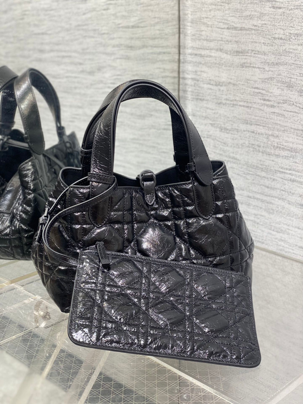 Dior quilted handbag with front pocket panel, dark metallic leather and top handles