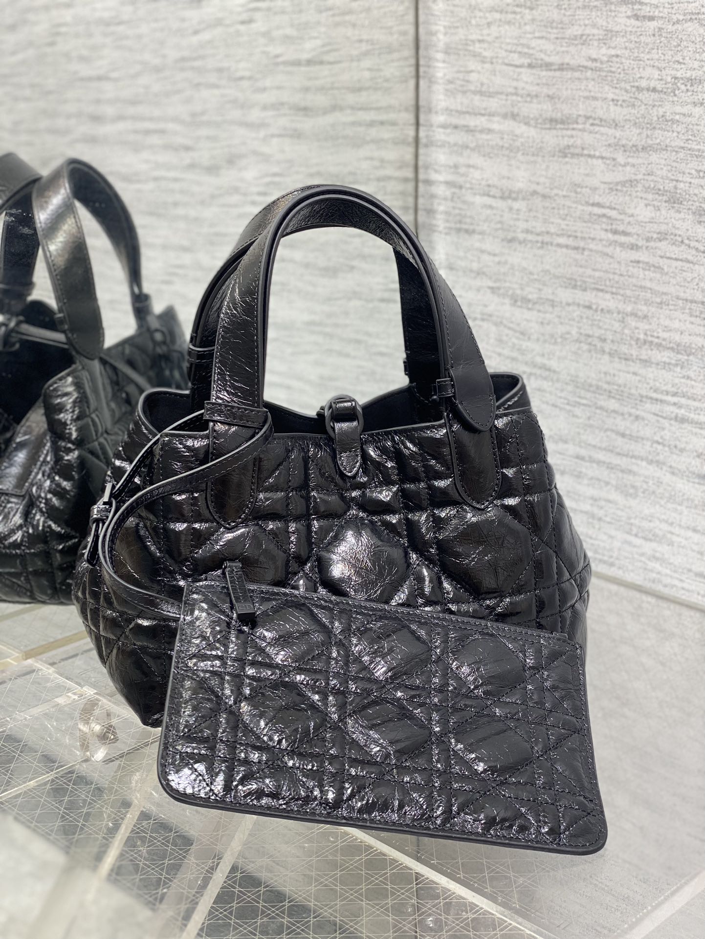 Dior quilted handbag with front pocket panel, dark metallic leather and top handles