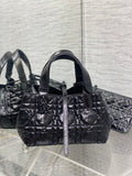 Dior quilted small tote bag in dark metallic leather, top handles and front clasp
