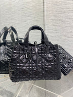 Dior tote bag with top handles, silver-tone hardware, quilted black exterior