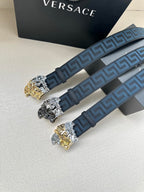 Pair of dark blue Greca belts with gold and silver Medusa buckle details
