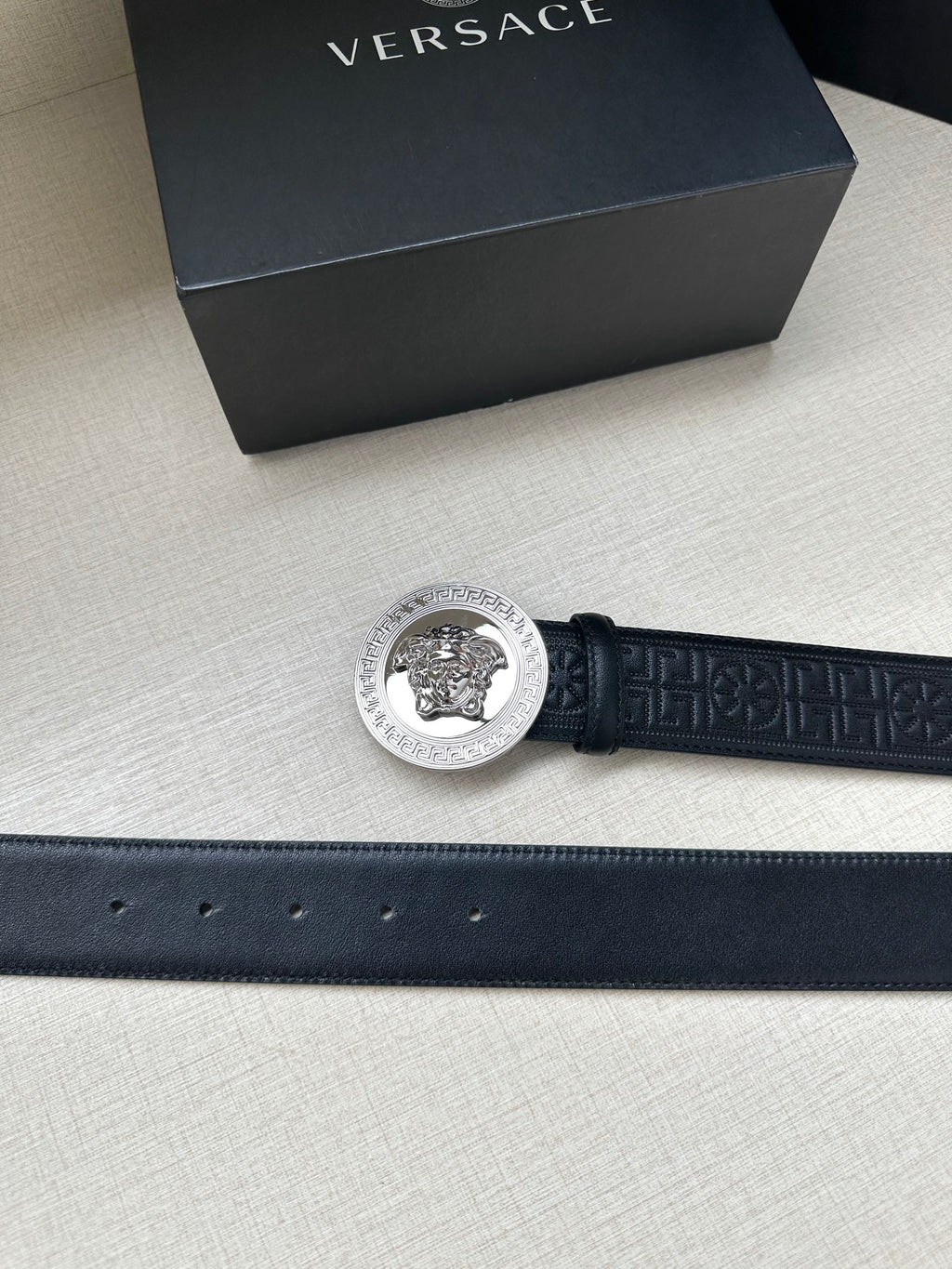 Versace belt in dark blue with silver round Medusa buckle and stitched strap edge.