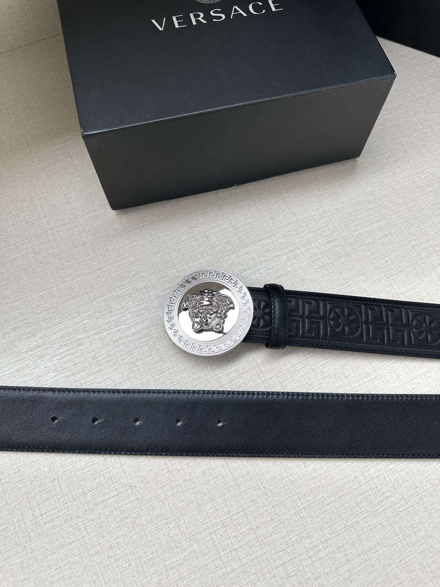 Versace belt in dark blue with silver round Medusa buckle and stitched strap edge.