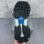 Balenciaga unisex sneaker outsole, textured black tread with purple accent near heel