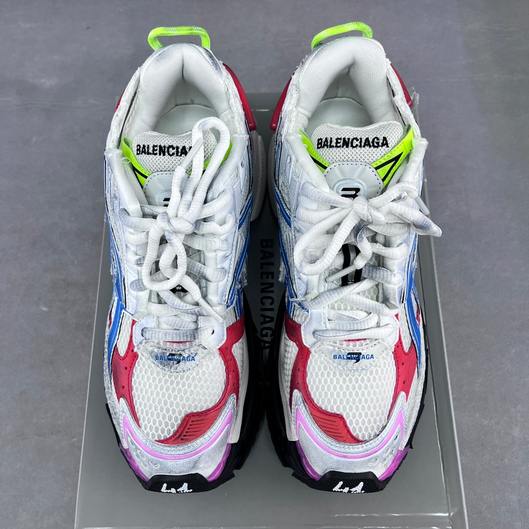 Balenciaga unisex sneakers front view, white uppers with blue and red overlays, neon green laces
