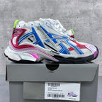 Balenciaga unisex sneakers on box, white mesh with blue and red overlays, neon green accents