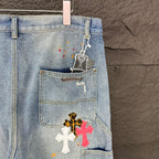 Light blue denim shorts with hanging tag and cross patch on front pocket