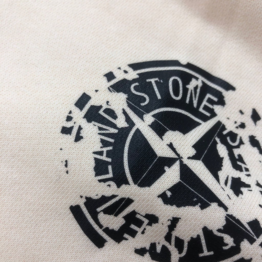 Stone Island logo graphic on cream fabric