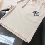 Stone Island cream shorts front view with drawstring and small logo