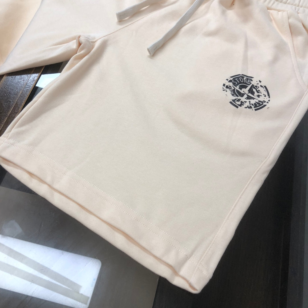 Stone Island cream shorts front view with drawstring and small logo