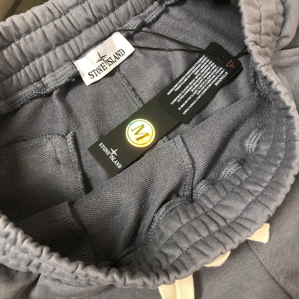 Drawstring shorts inside view, elastic waistband and brand label