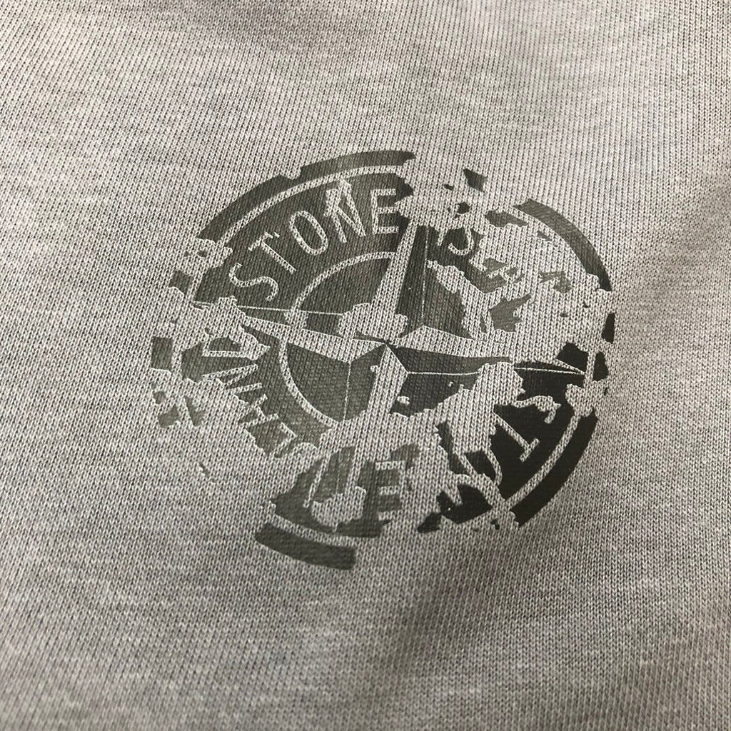 Graphic logo print on gray knit fabric
