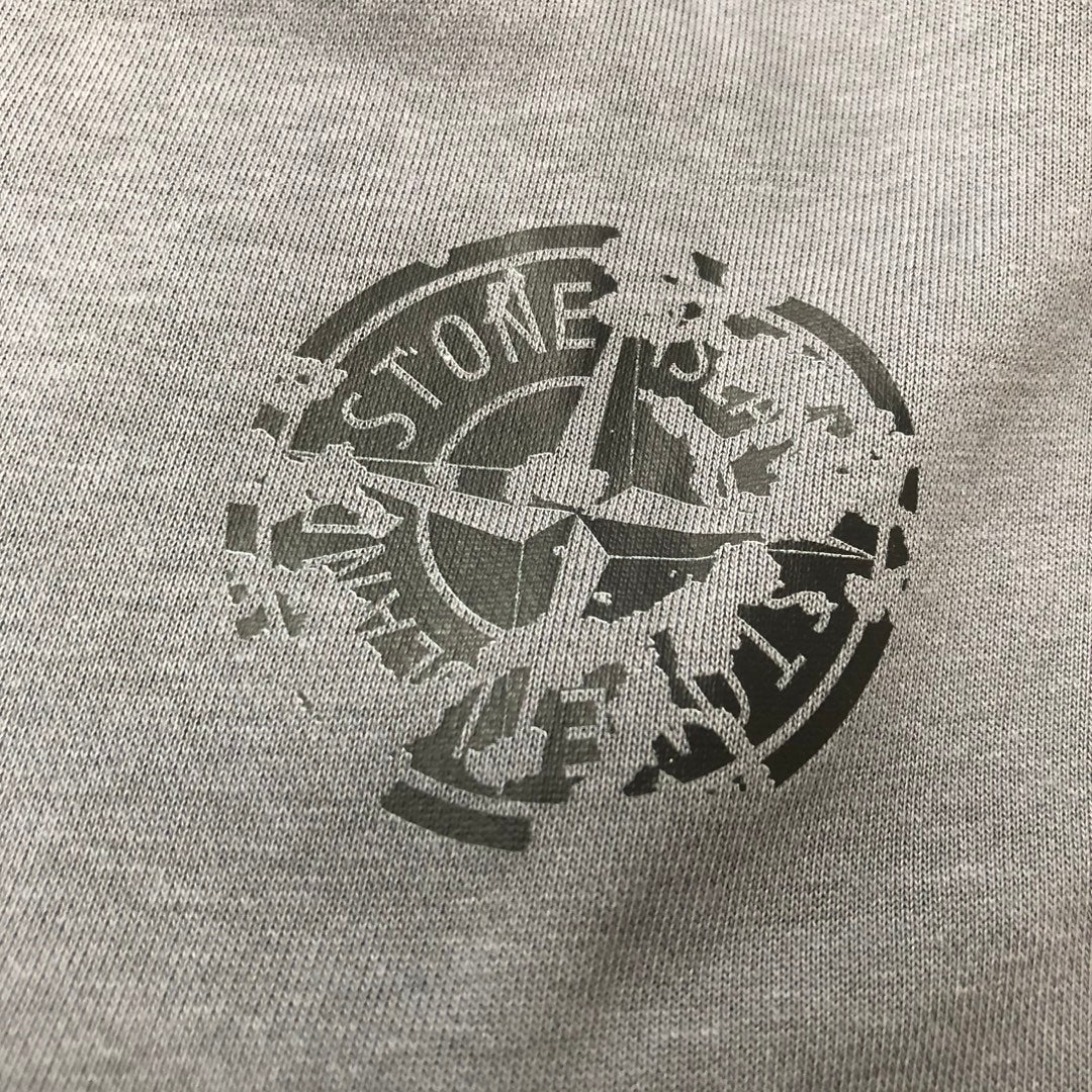 Graphic logo print on gray knit fabric