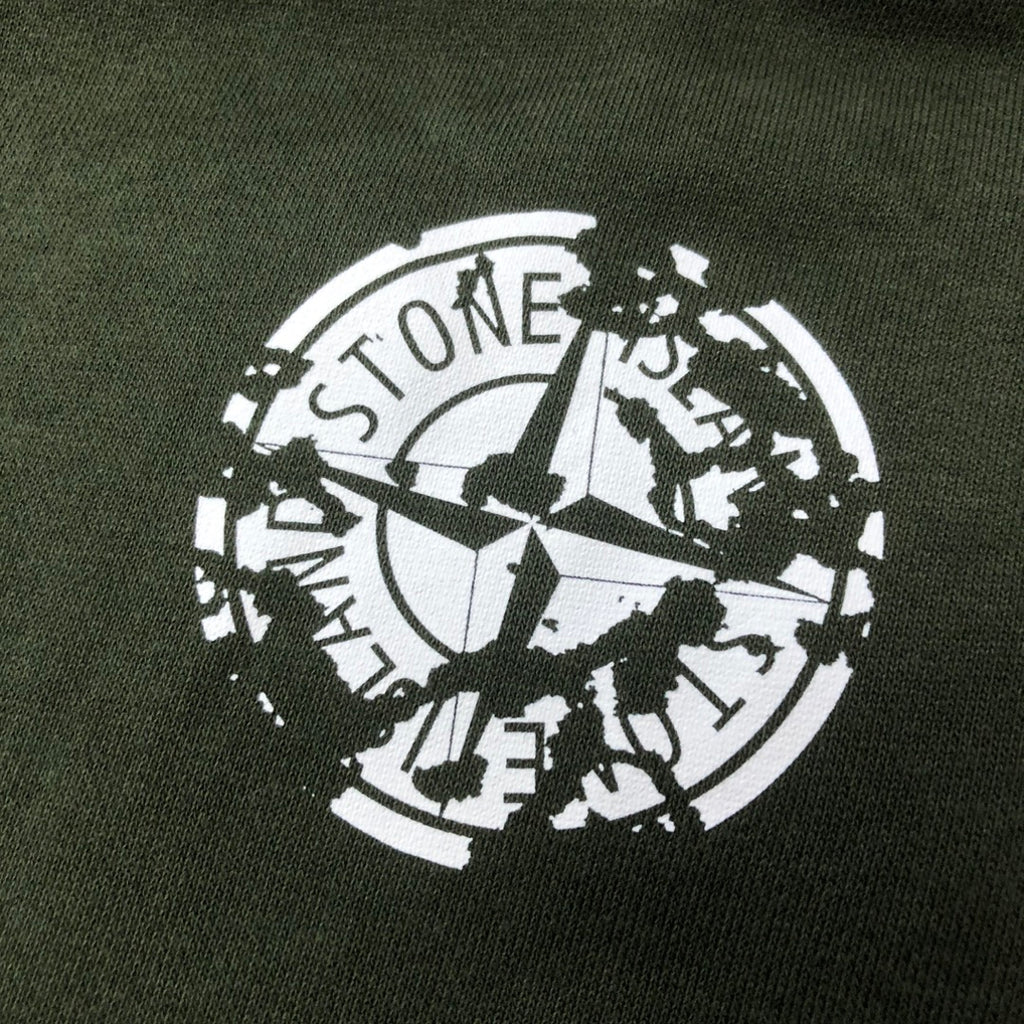 Stone Island logo print on dark green shorts fabric