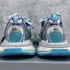 Balenciaga running shoes heel view with BALENCIAGA logo on light blue midsoles.