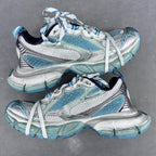 Balenciaga unisex running shoes in aqua blue, silver, and white with lace-up design.