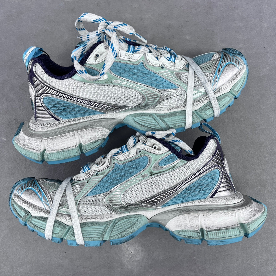 Balenciaga unisex running shoes in aqua blue, silver, and white with lace-up design.