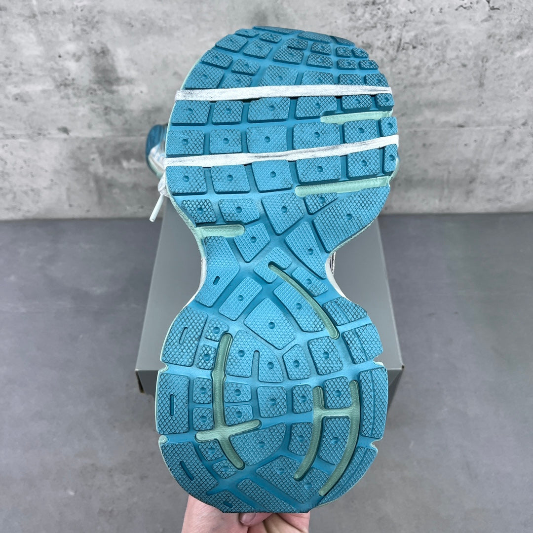 Balenciaga running shoes outsole in bright blue rubber with molded tread pattern.