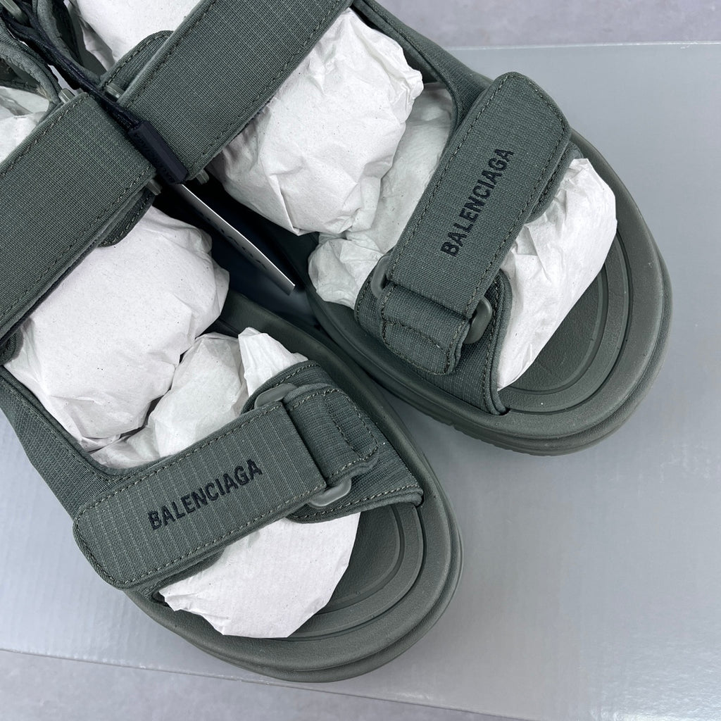 Balenciaga dark green slide sandals with BALENCIAGA logo on two straps