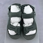 Balenciaga dark green sandals, top view of two straps over a cushioned footbed