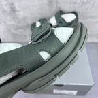 Balenciaga dark green sandal, close-up of side strap and padded ankle band