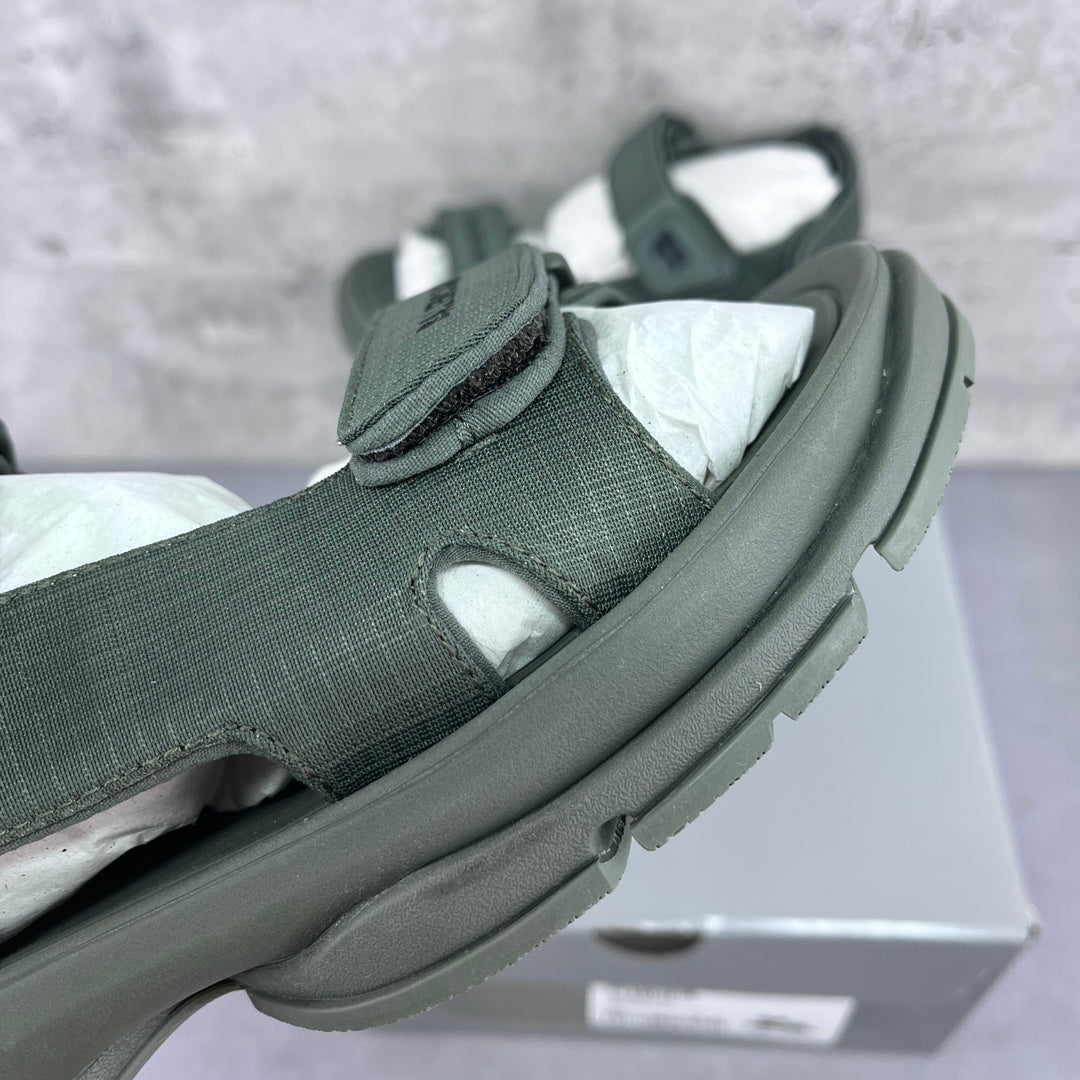 Balenciaga dark green sandal, close-up of side strap and padded ankle band