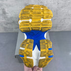 Balenciaga unisex sneaker outsole view with yellow tread and blue midfoot section.