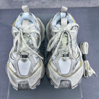 Balenciaga unisex sneakers, heel view with lace ties and padded collars, silver and white