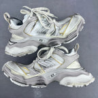 Balenciaga unisex chunky sneakers pair, silver and white with yellow accents, lace-up