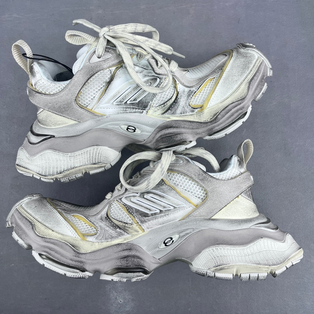 Balenciaga unisex chunky sneakers pair, silver and white with yellow accents, lace-up