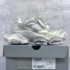 Balenciaga unisex chunky sneakers, silver and white with yellow highlights, side view