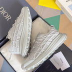 Dior unisex white sneakers, side view with lace-up front and chunky sole