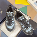 Unisex lace-up sneakers with light blue mesh panels, dark gray overlays, chunky sole